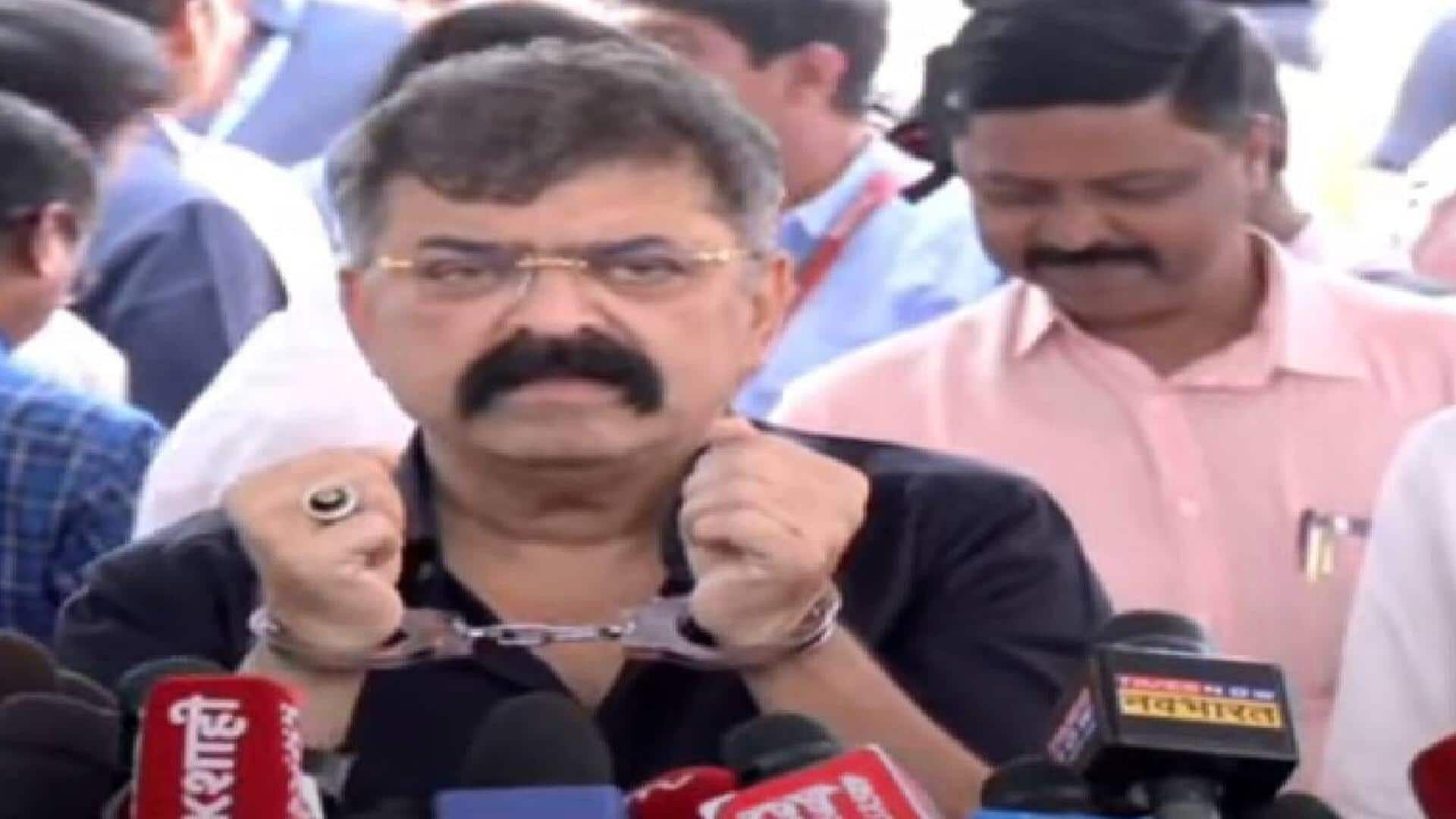 Maharashtra: NCP's Jitendra Awhad enters Vidhan Bhavan complex wearing handcuffs