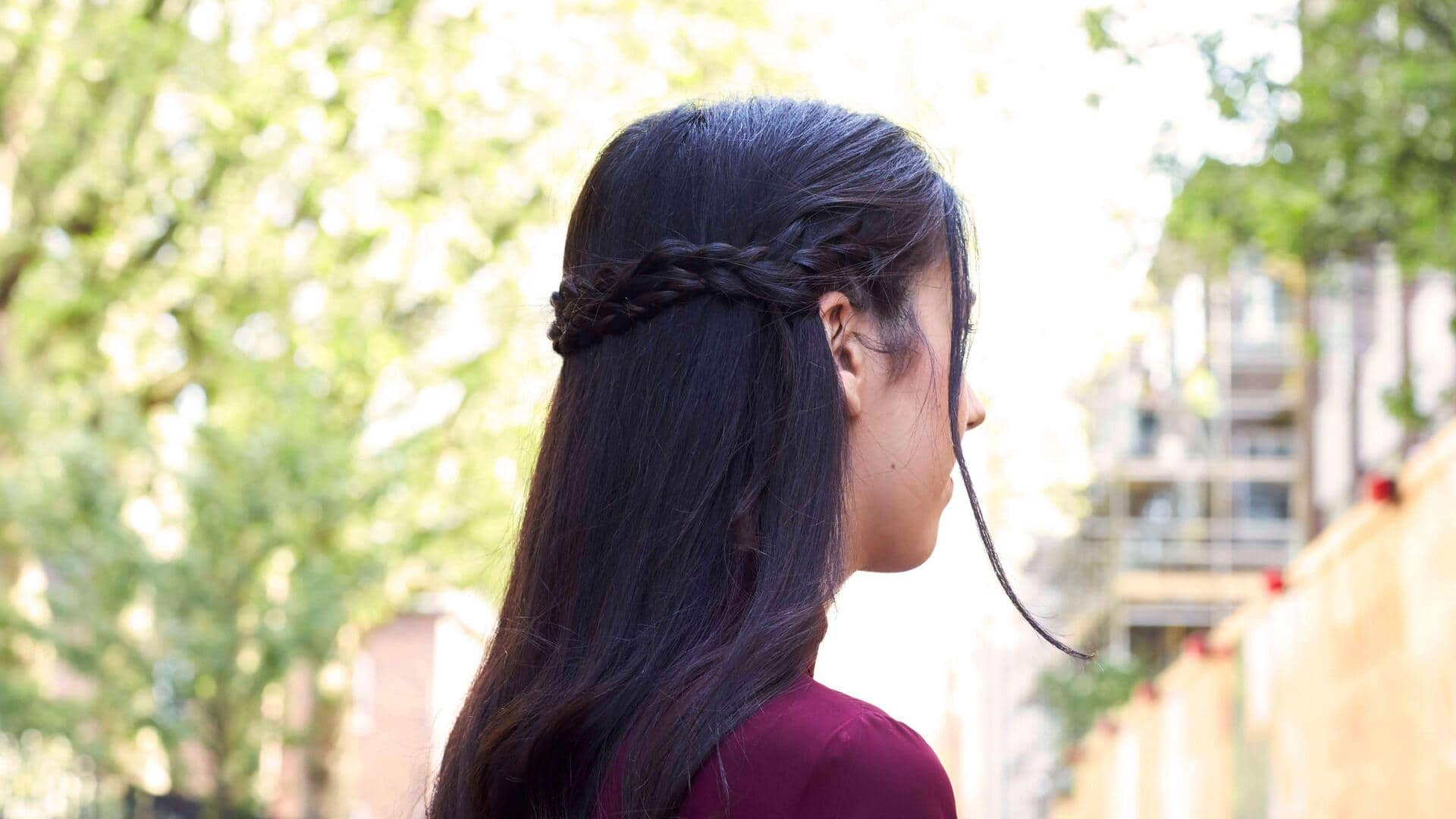 Ethereal half-up crown braids for long wavy hair