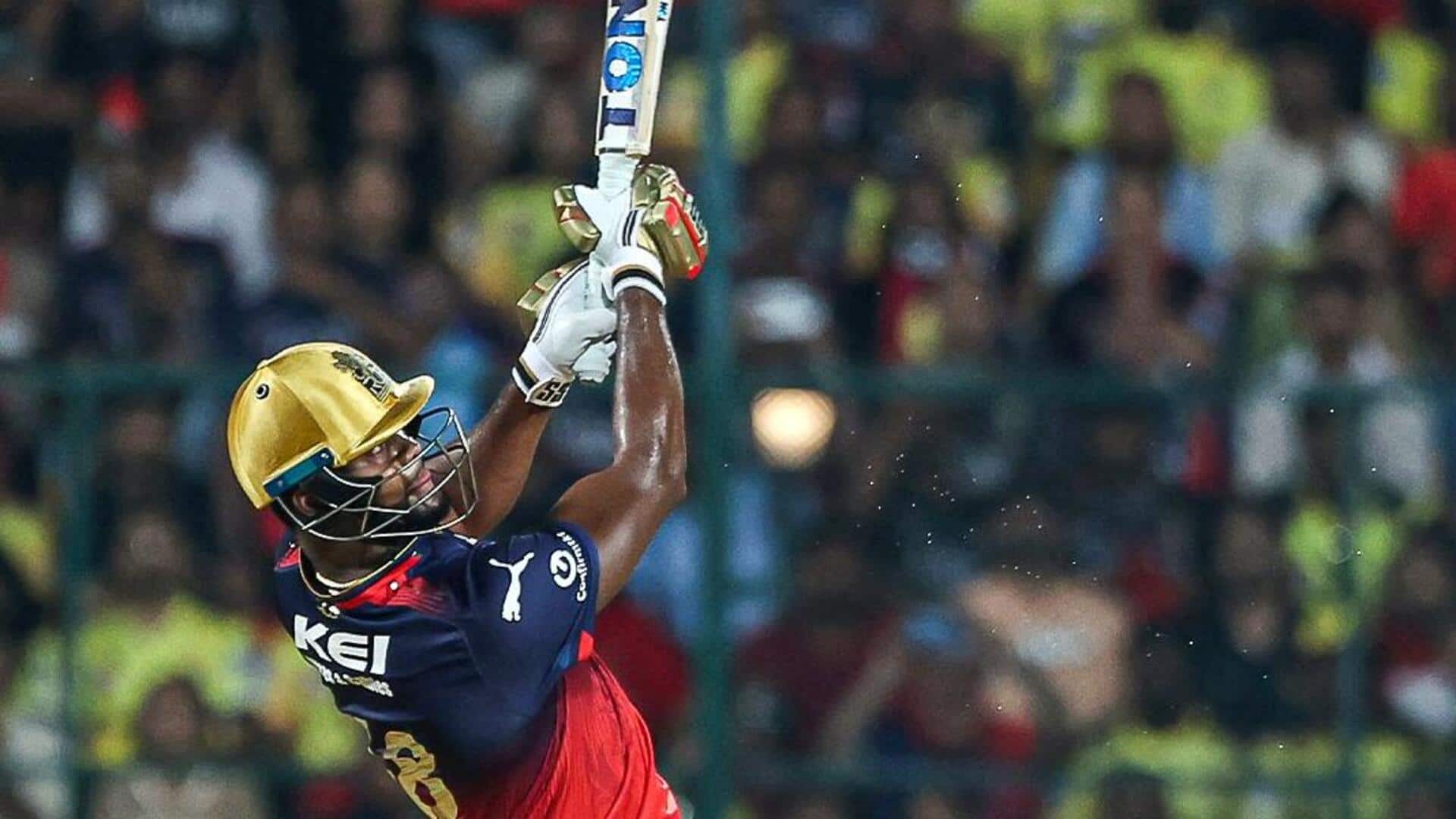Romario Shepherd slams fastest half-century for RCB in IPL: Stats Romario Shepherd slams fastest half-century for RCB in IPL: Stats