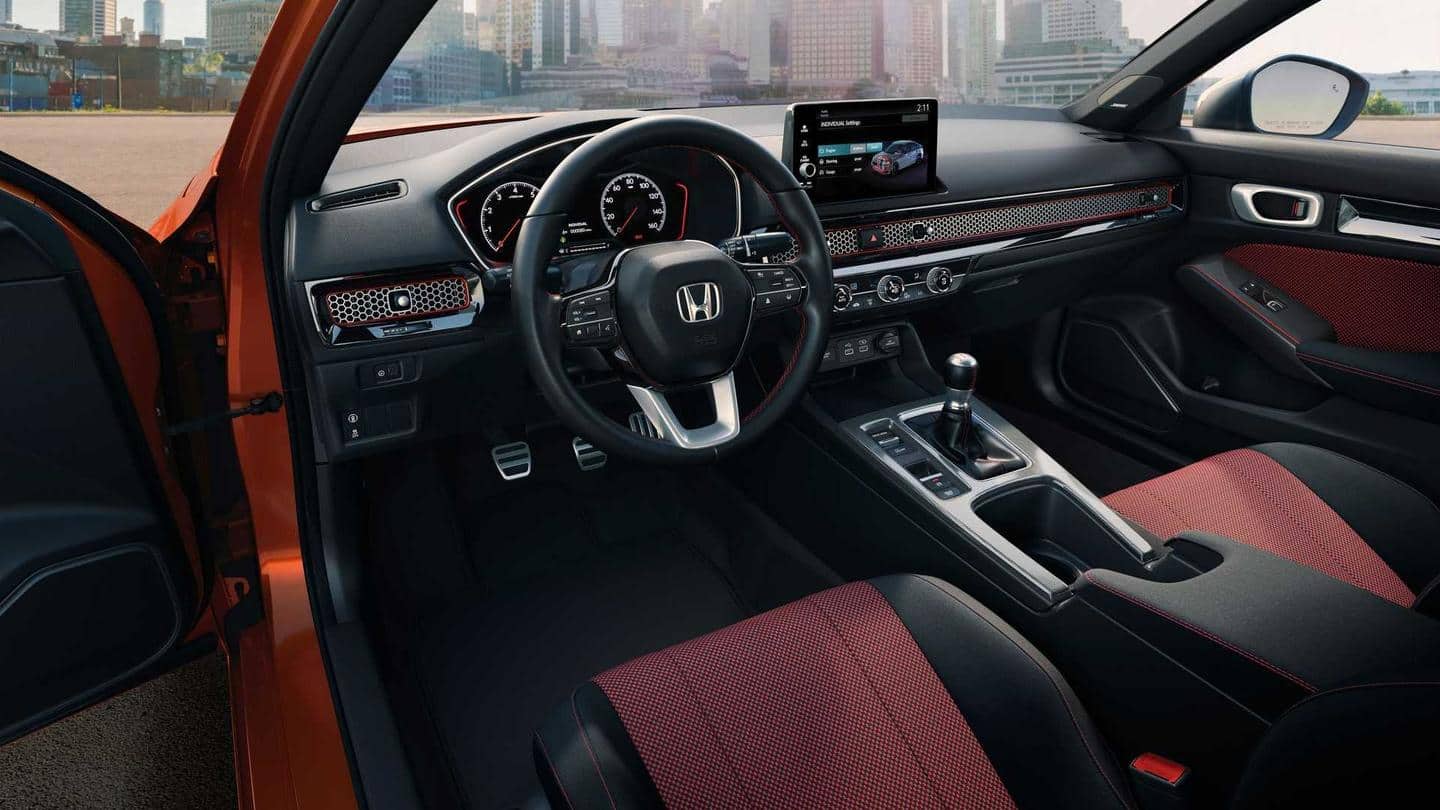The sedan gets a Bose audio system and multiple airbags The sedan gets a Bose audio system and multiple airbags