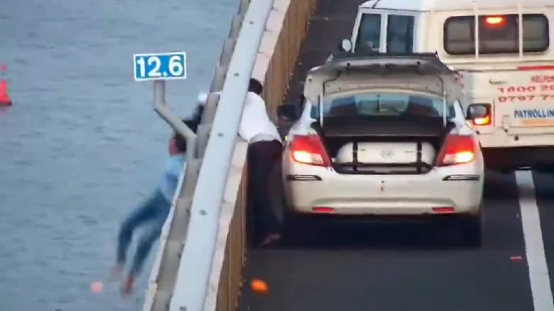 Video: Cabby, cops save woman jumping off Atal Setu