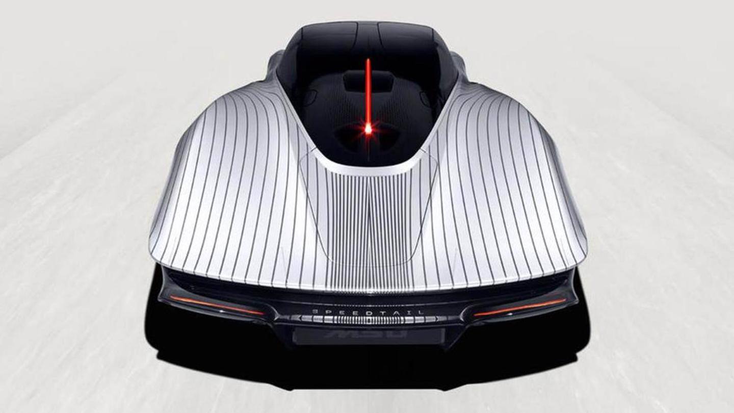 The car has dihedral doors and narrow headlights The car has dihedral doors and narrow headlights