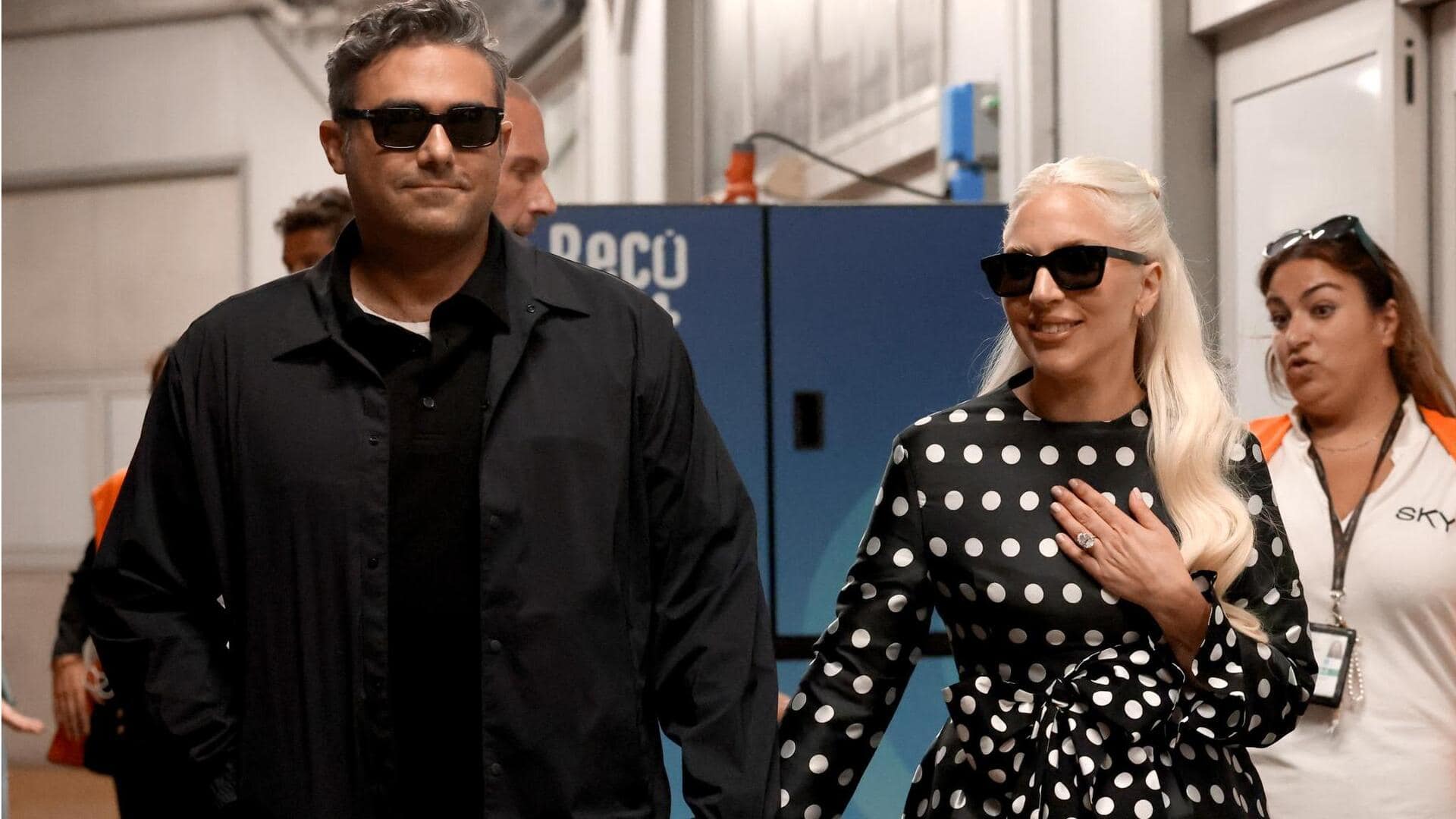 Gaga finally flashing that rock! See her giant engagement ring