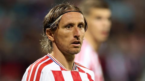 Embarrassed Luka Modric reacts to Croatia's 7-0 loss against England
