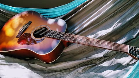 Listen to acoustic music for a happier mind