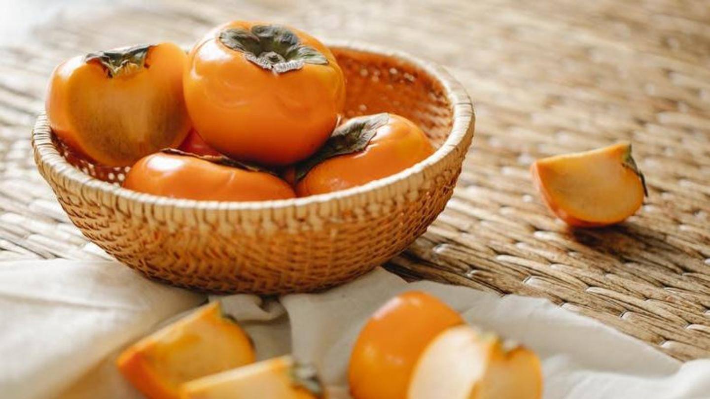 Place a bowl of oranges Place a bowl of oranges
