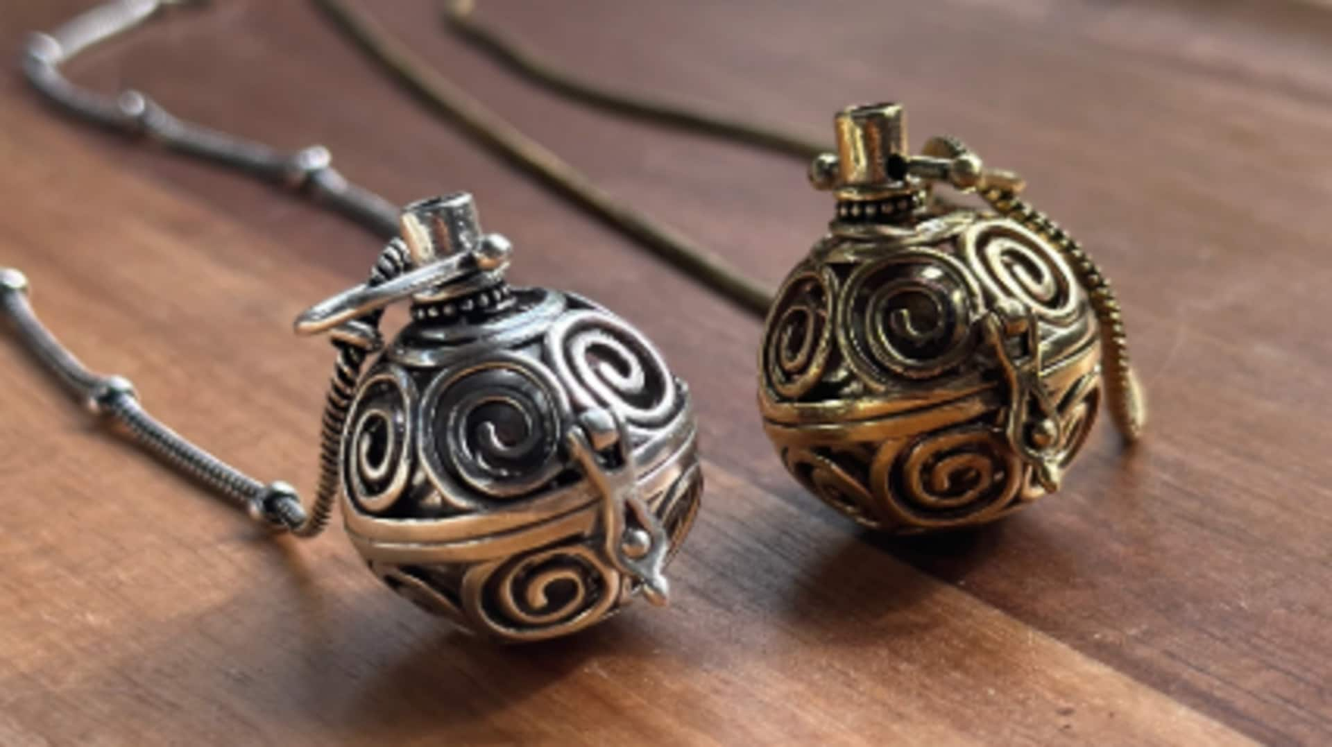 Crafting elegance with perfume locket necklaces