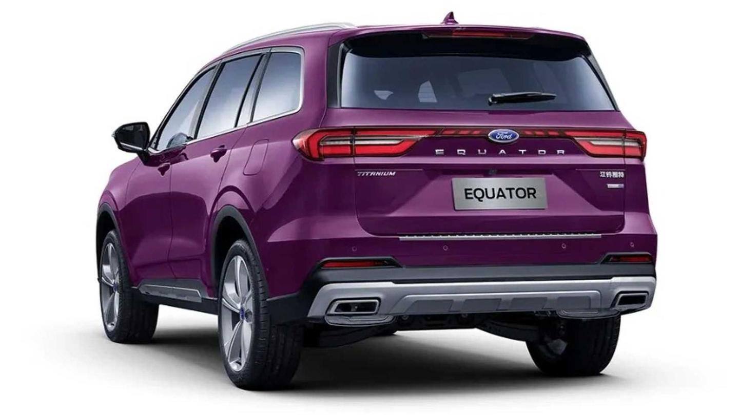 The car sports a large chrome-accented grille The car sports a large chrome-accented grille