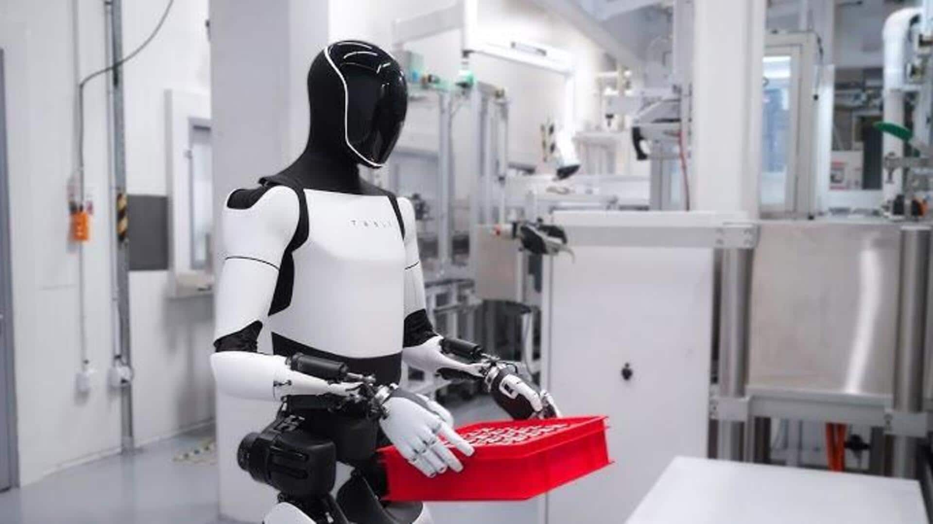 Watch: Musk's Optimus humanoid robot can stir pots, clean tables Watch: Musk's Optimus humanoid robot can stir pots, clean tables