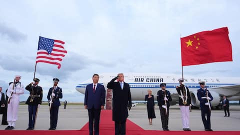 Trump rolls out 100-foot-long red carpet for Xi's arrival 