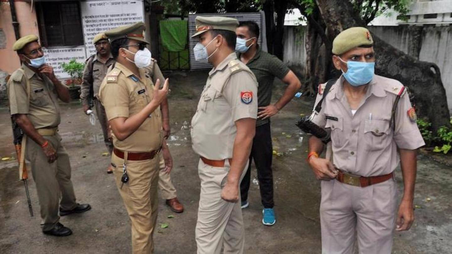 Two of the four accused held by the police Two of the four accused held by the police