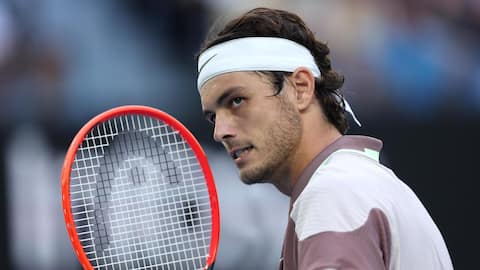 Australian Open: Taylor Fritz survives Royer scare, reaches second round