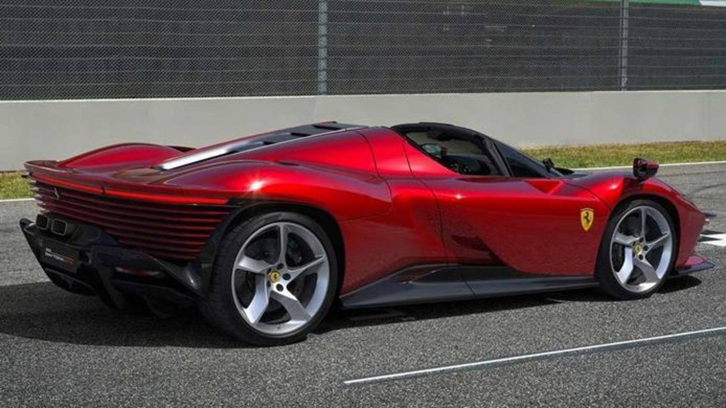 The car has a wrap-around windshield and twin exhaust tips The car has a wrap-around windshield and twin exhaust tips