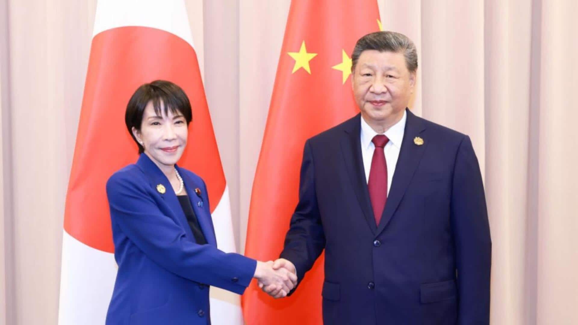 Xi scolded Japan's PM over 'remilitarization' during Trump summit 