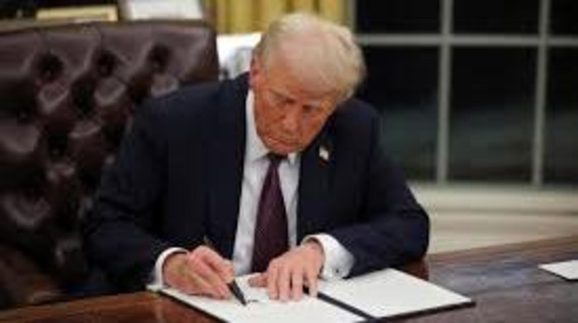 Trump signs executive order exempting certain imports from tariffs
