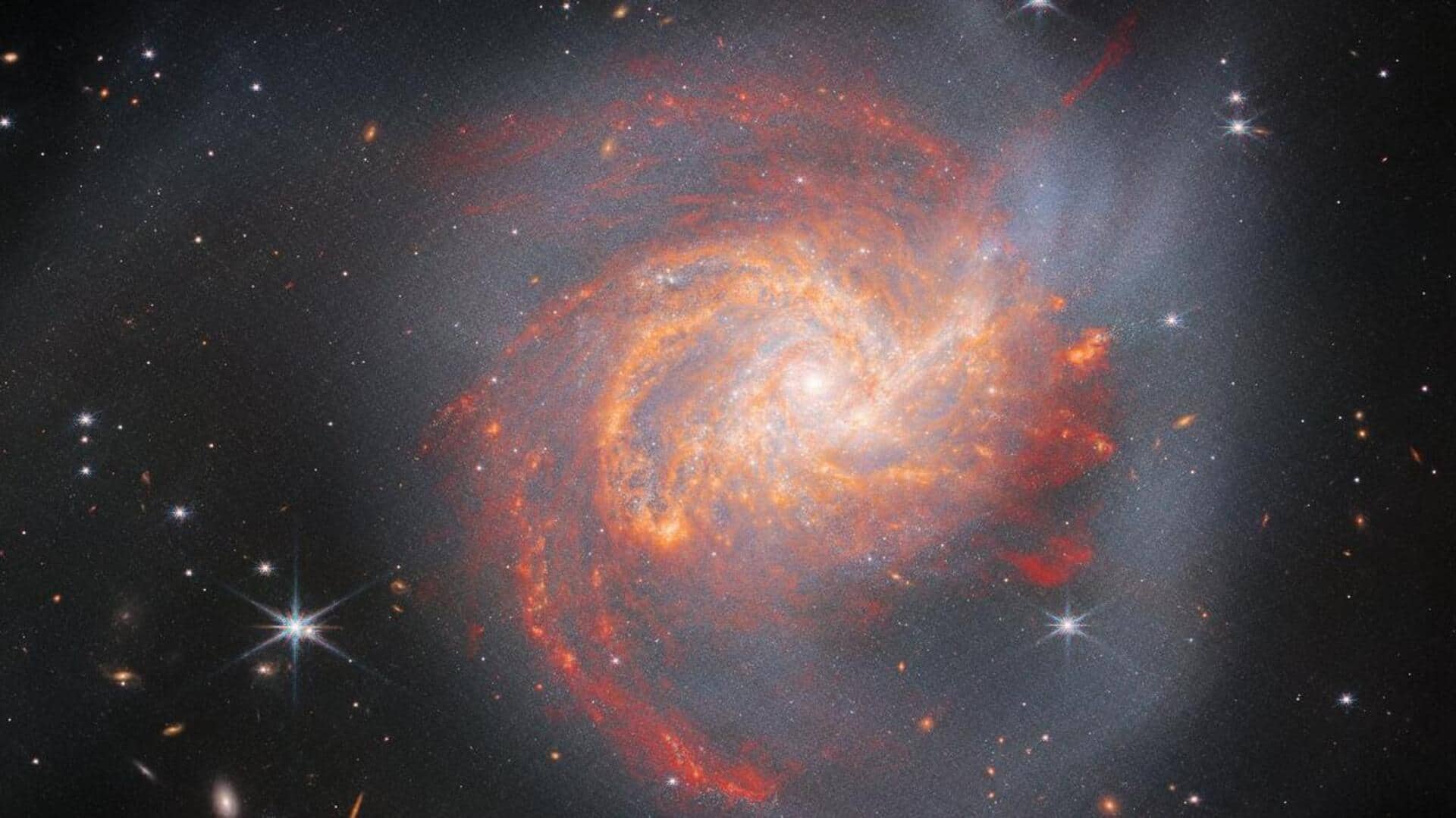 NASA's Webb photographs spectacular spiral galaxy born from 'cosmic clash'