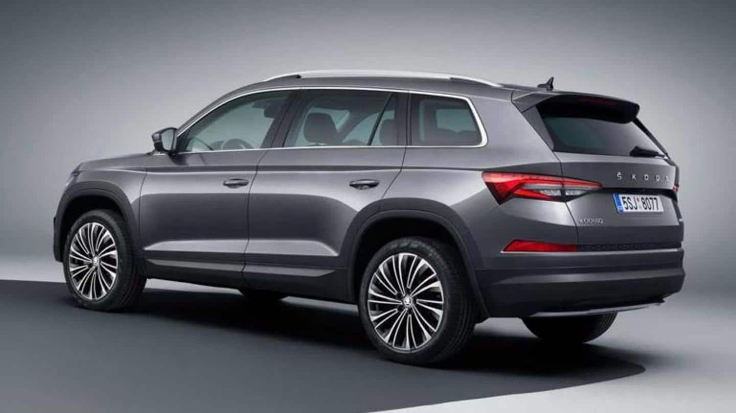 The car has a roof-mounted spoiler and multi-slat butterfly grille The car has a roof-mounted spoiler and multi-slat butterfly grille