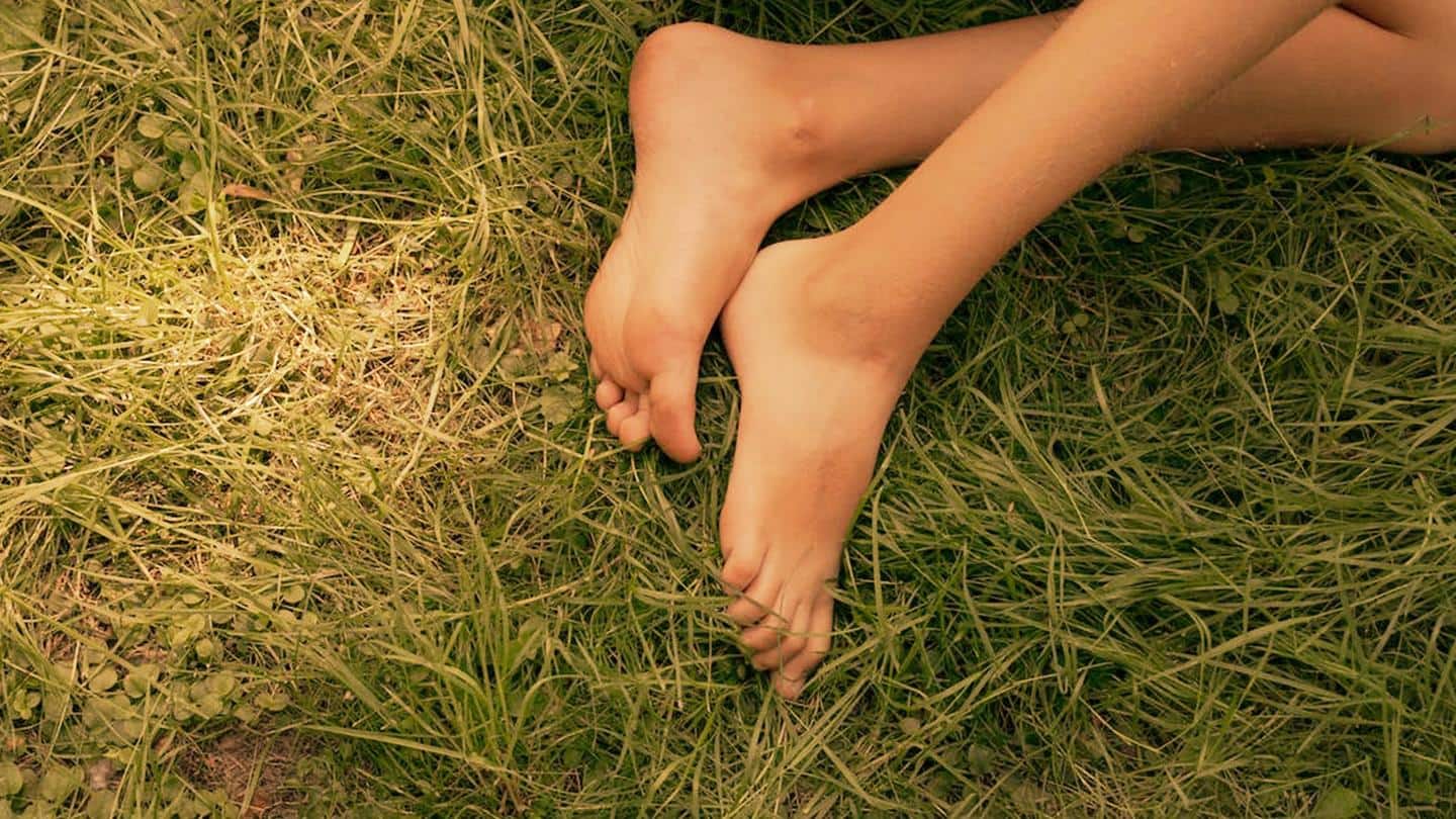 Skip slippers and walk barefoot on grass for these benefits