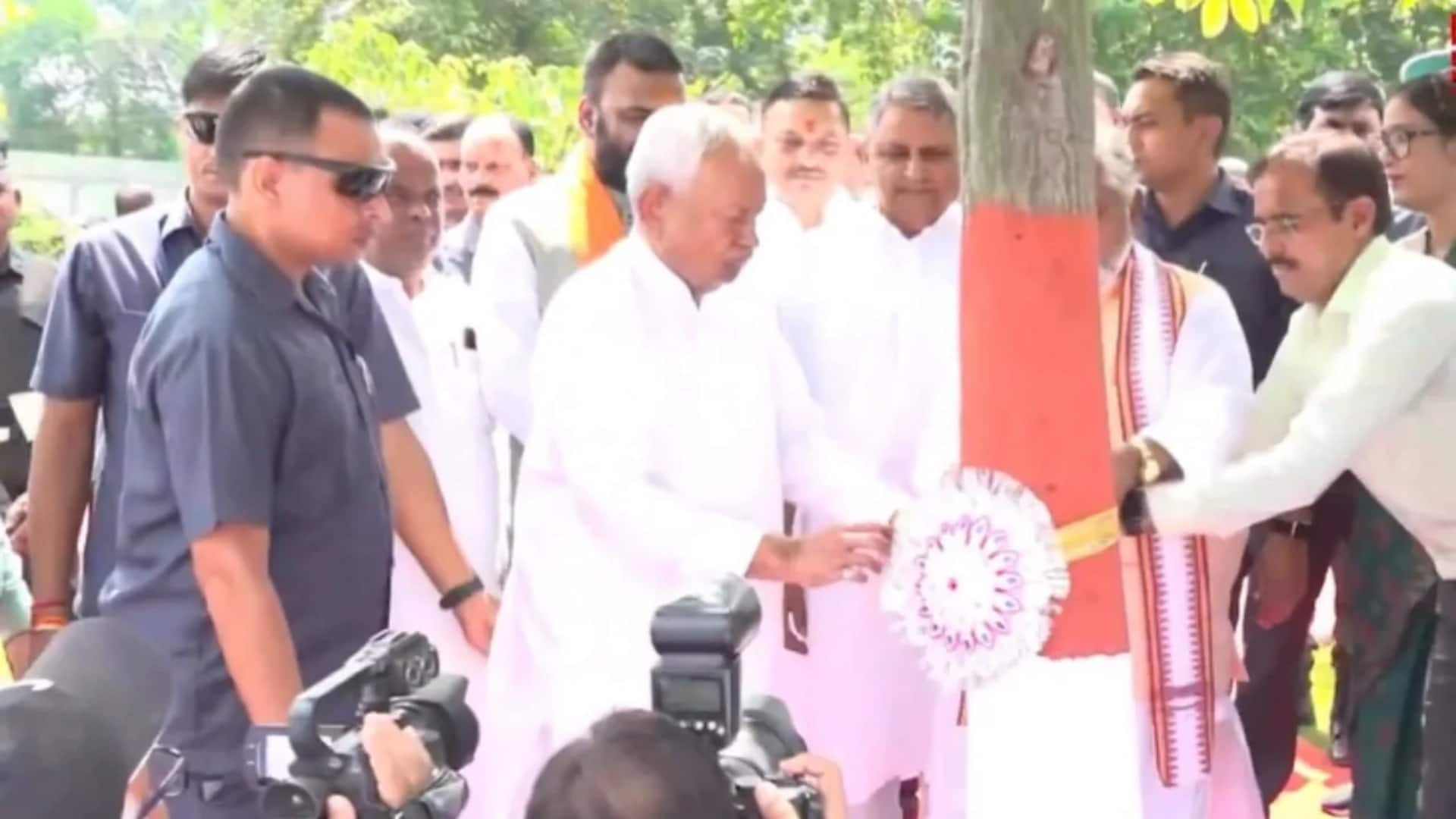 Bihar CM Nitish Kumar ties rakhi to tree