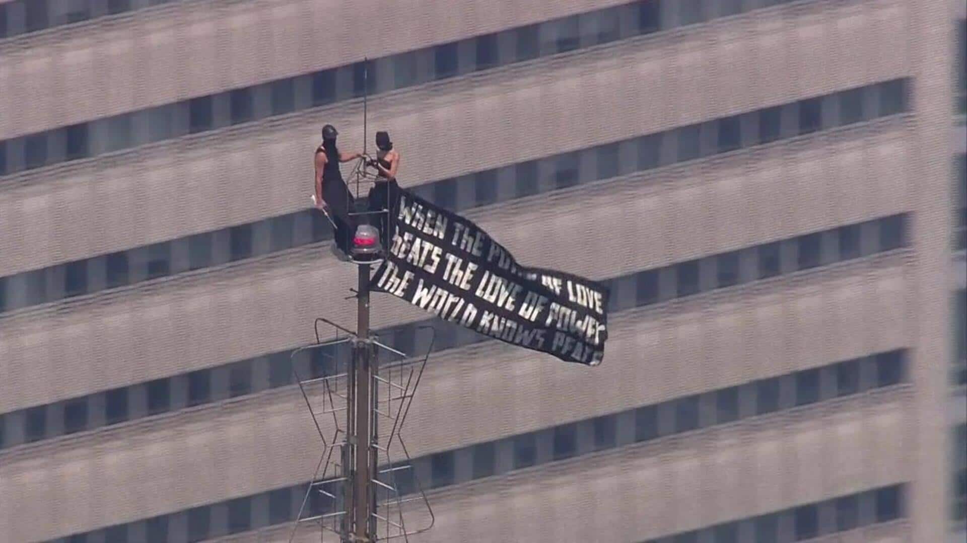 Russian couple arrested after daring Empire State marriage proposal stunt 