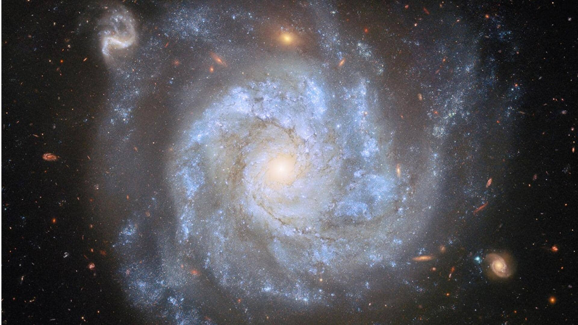 Watch: Hubble telescope snaps a spiral galaxy 100M light-years away Watch: Hubble telescope snaps a spiral galaxy 100M light-years away