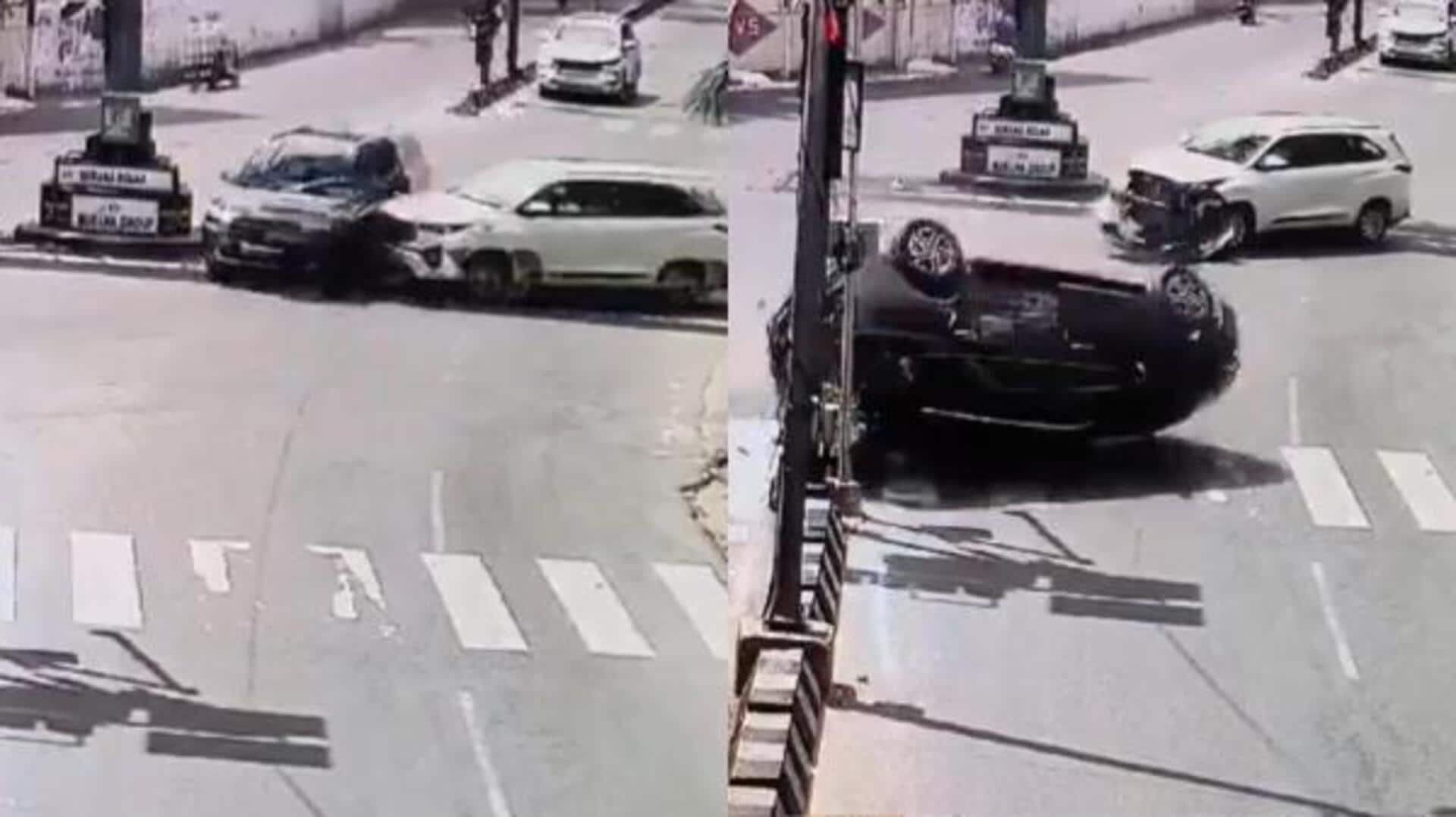 Video: Speeding car jumps signal, hits another, flips multiple times 