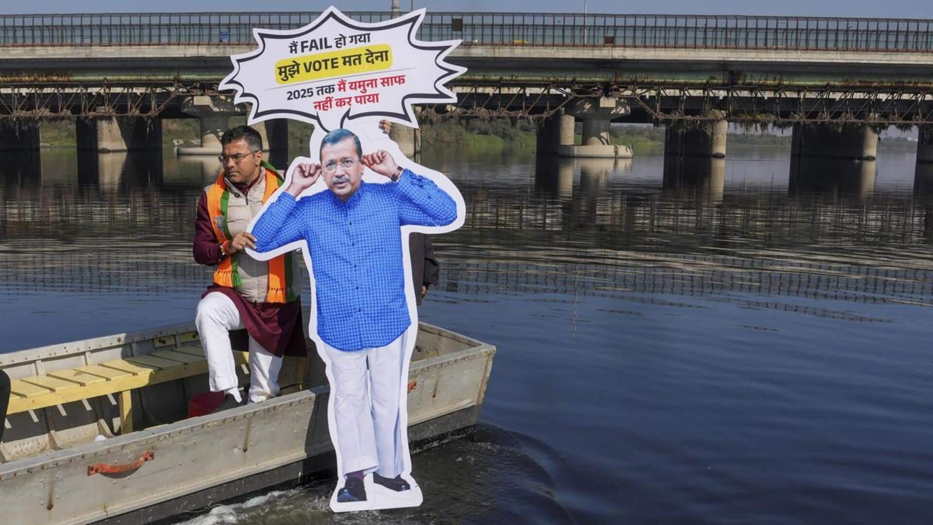 Delhi polls: BJP's Verma dips Kejriwal's cutout in Yamuna