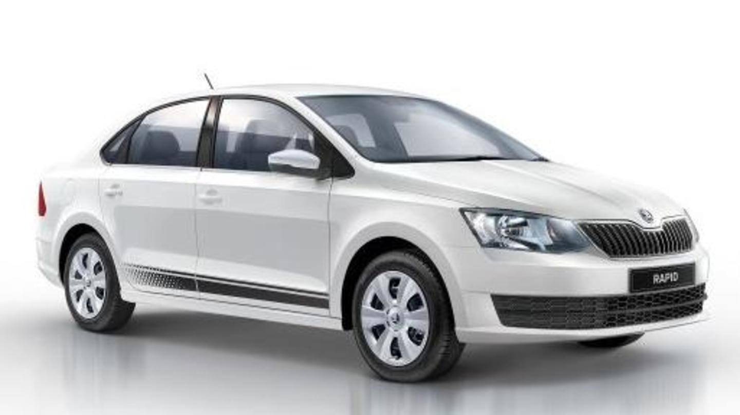 The car had a black grille and roof-mounted antenna The car had a black grille and roof-mounted antenna