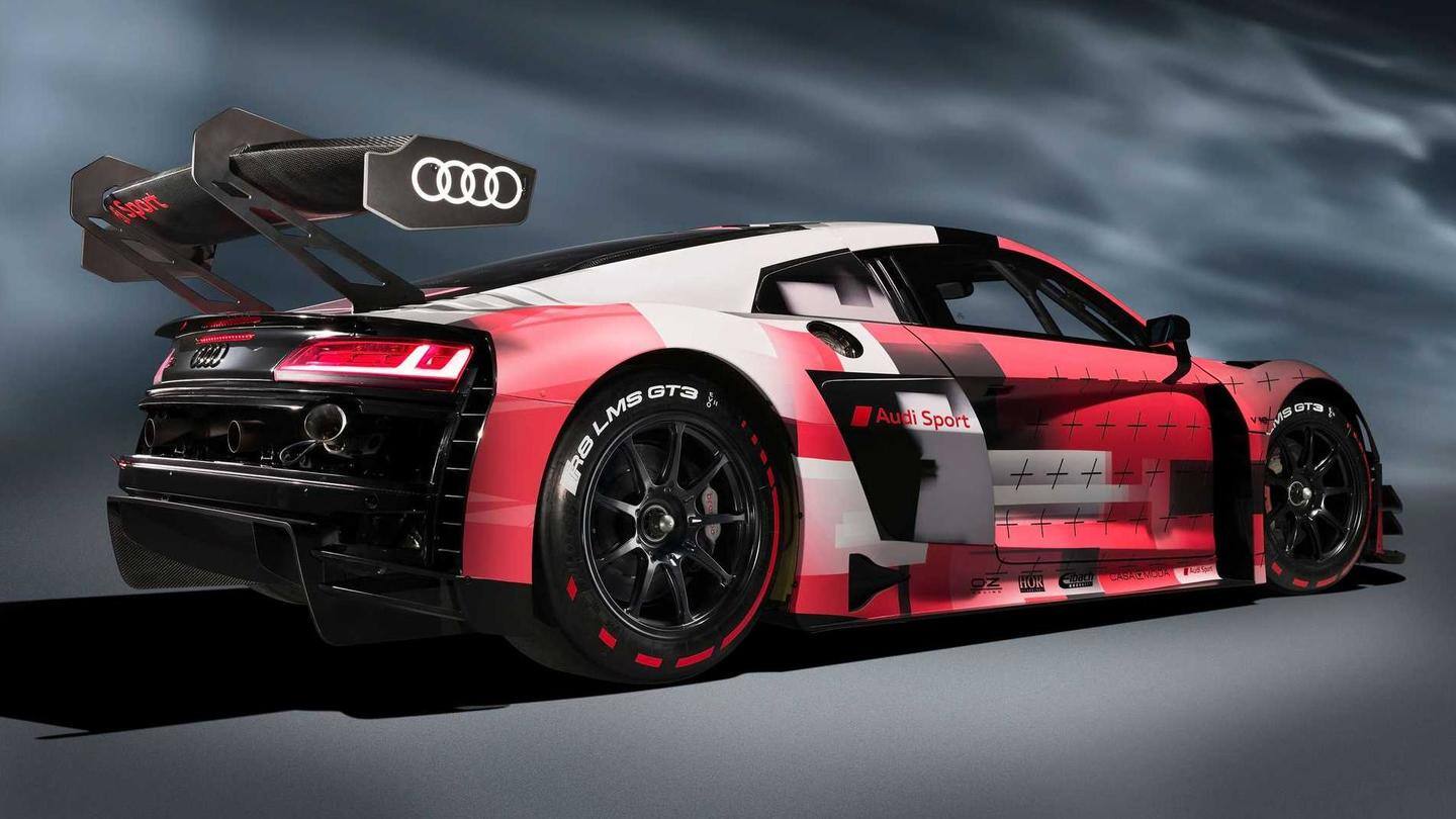 The car has a massive rear wing and twin exhausts The car has a massive rear wing and twin exhausts