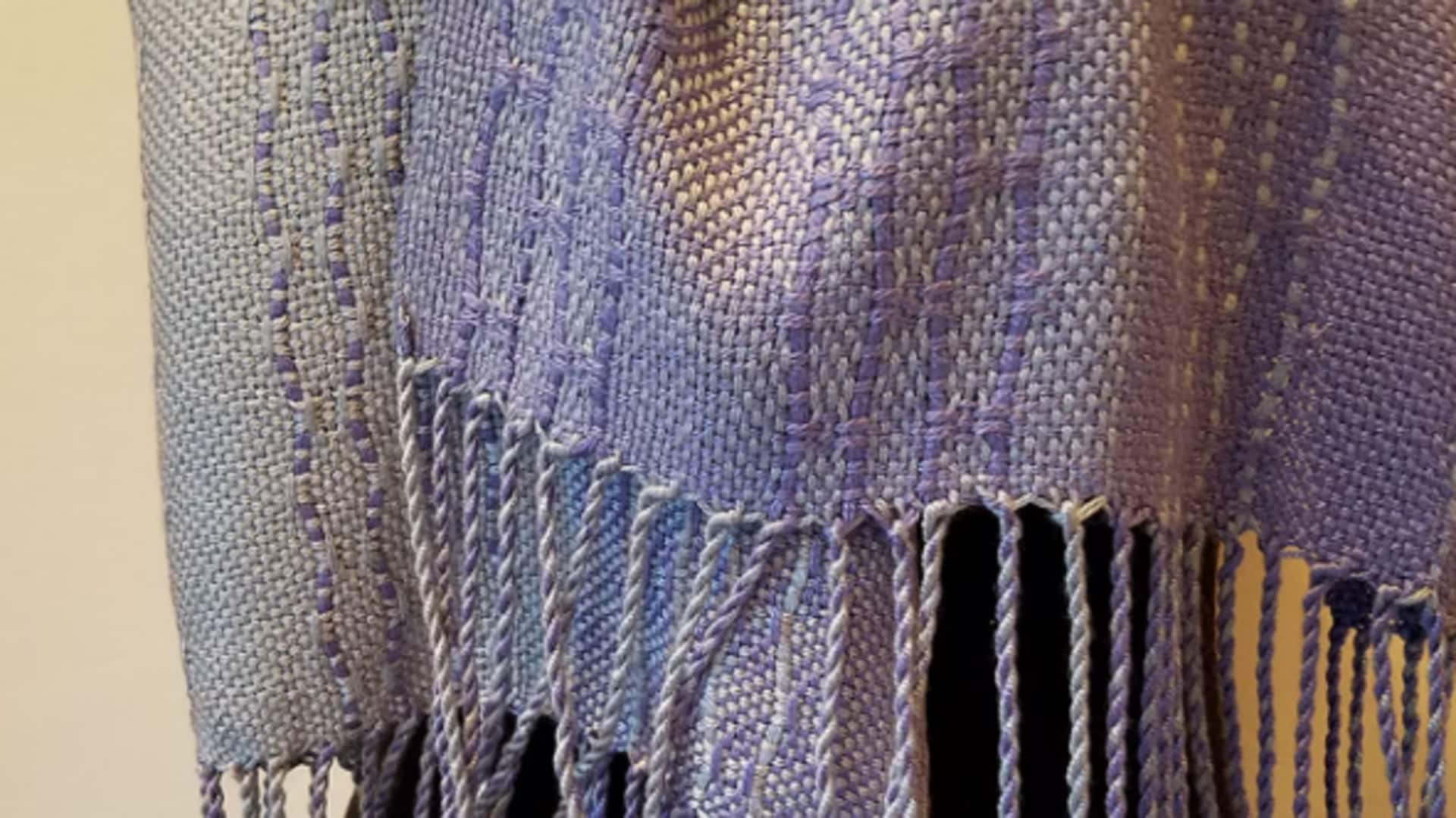 Innovating tradition: Loom-woven scarf magic