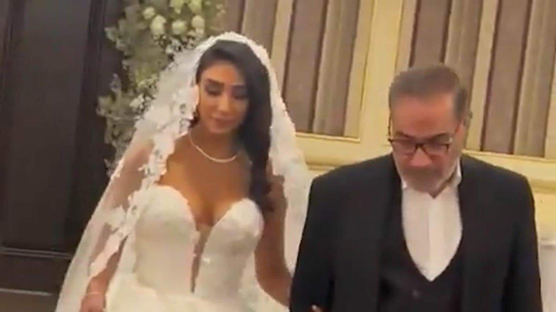 Iran hijab enforcer's daughter wears plunging wedding dress; sparks row Iran hijab enforcer's daughter wears plunging wedding dress; sparks row