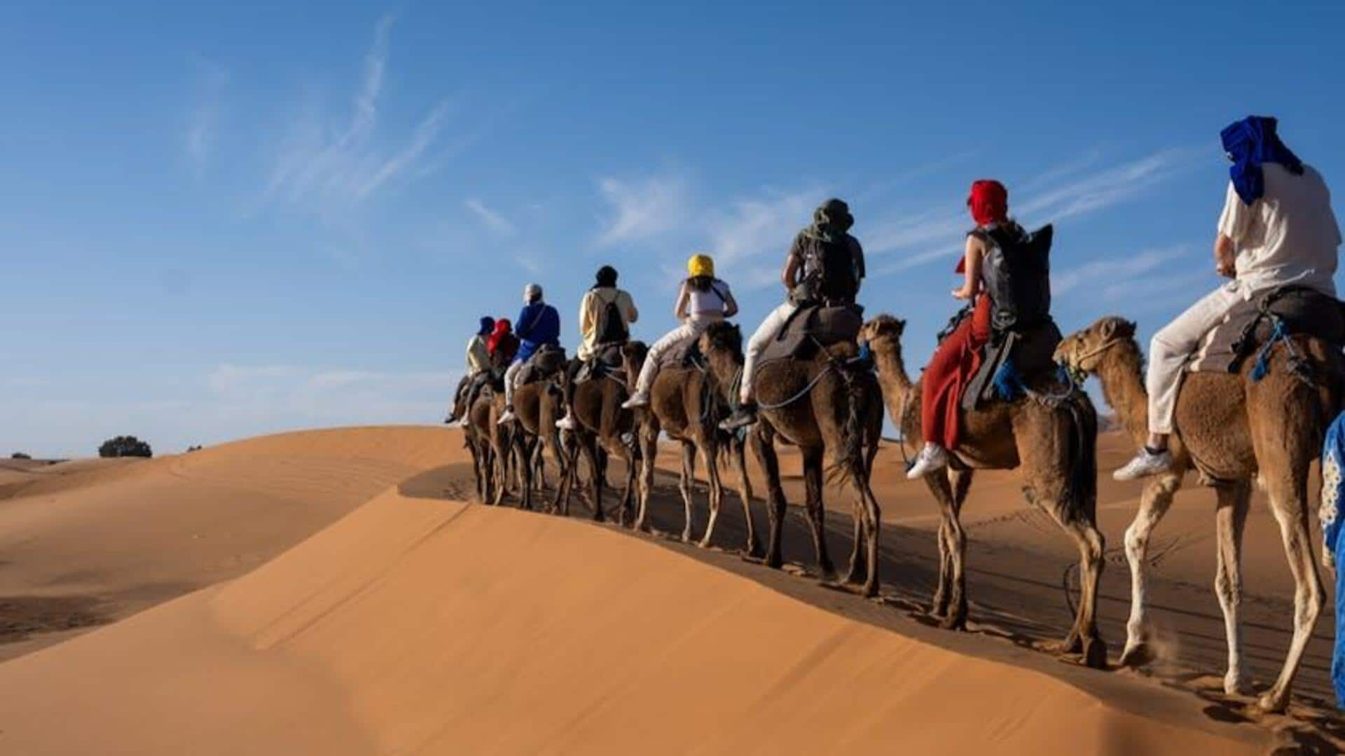 Camel trekking through Chad's Ennedi Plateau