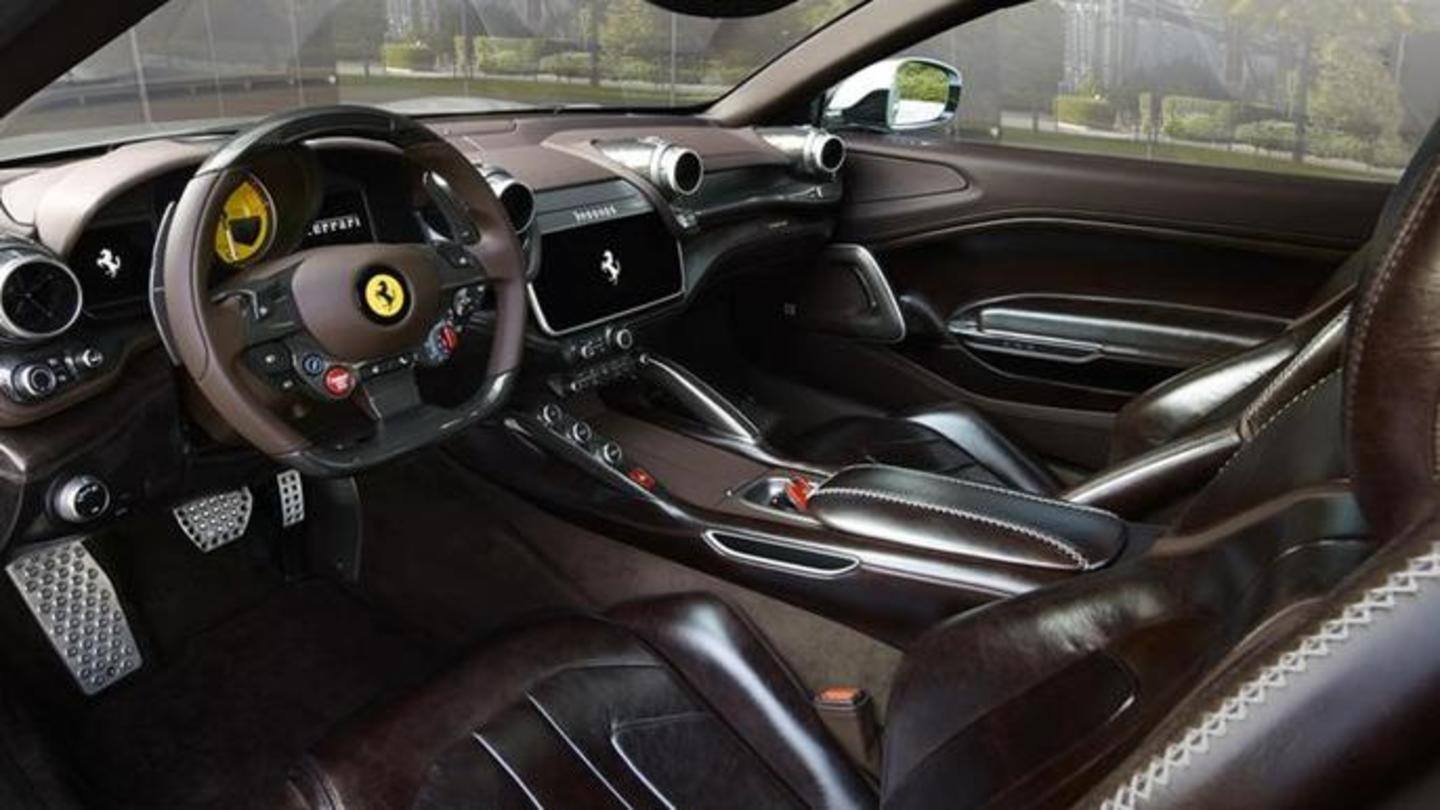 The coupe has a flat-bottom steering wheel and leather upholstery The coupe has a flat-bottom steering wheel and leather upholstery