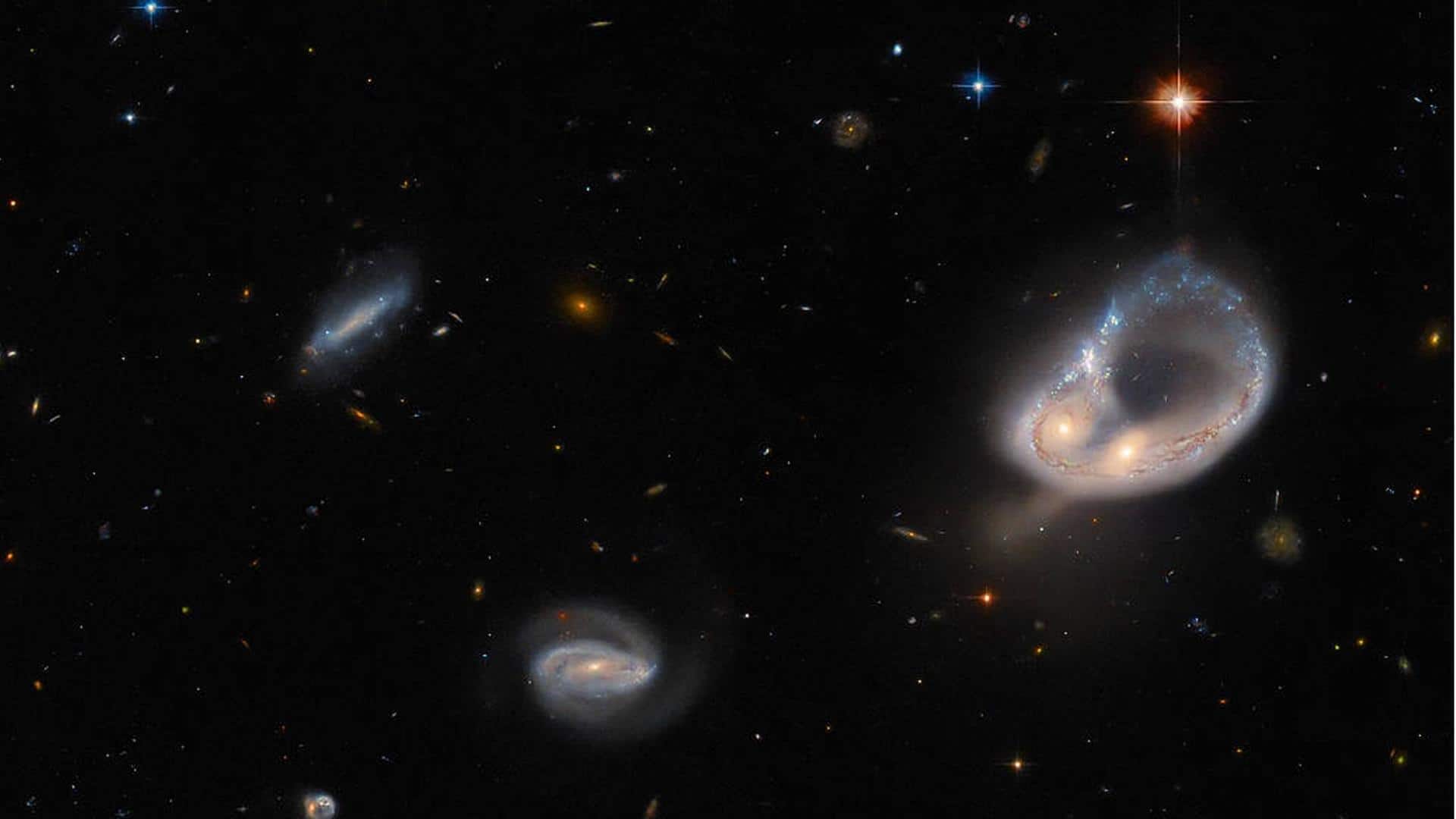 Hubble telescope snaps a "colossal ring" formed by interacting galaxies