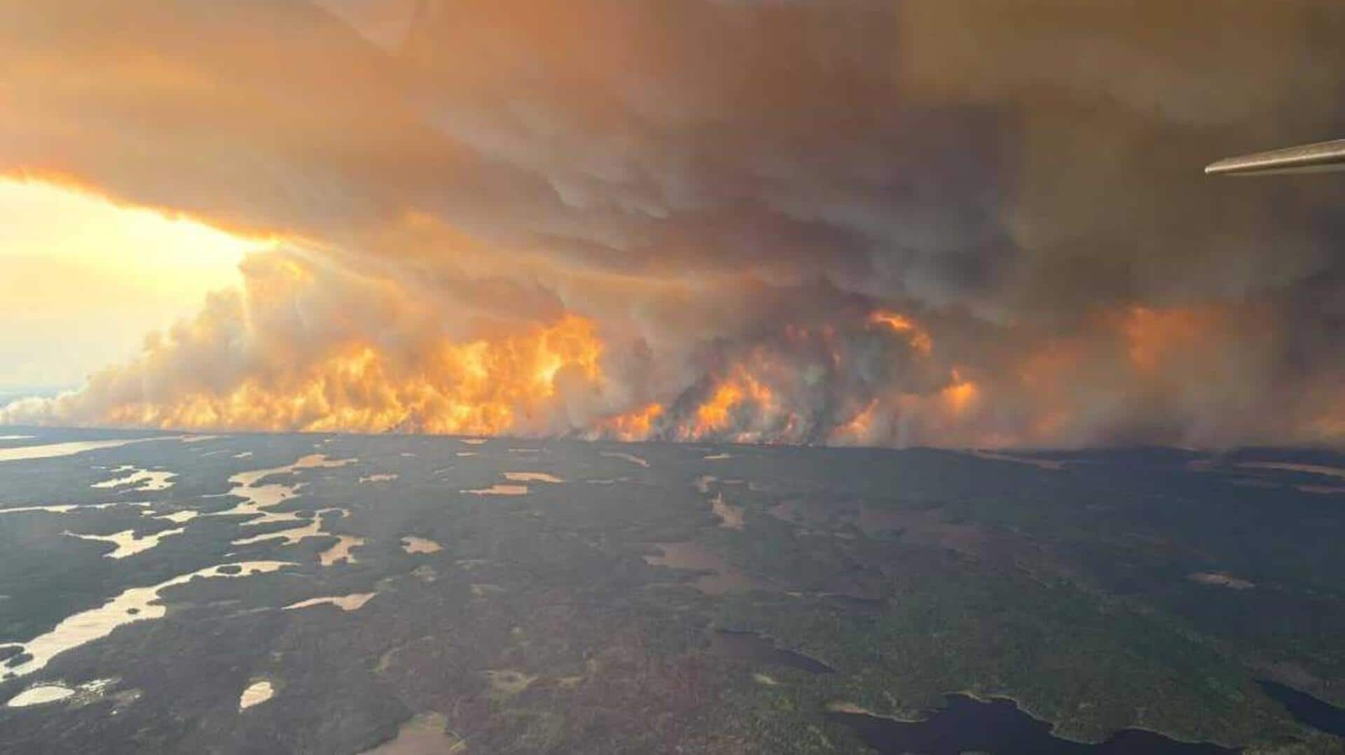 Over 25,000 evacuated as wildfires rage in 3 Canadian provinces Over 25,000 evacuated as wildfires rage in 3 Canadian provinces