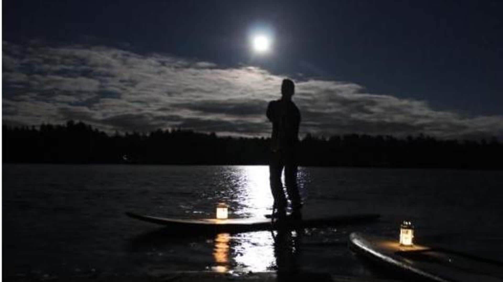 Lunar eclipse paddleboarding: Night glow adventures