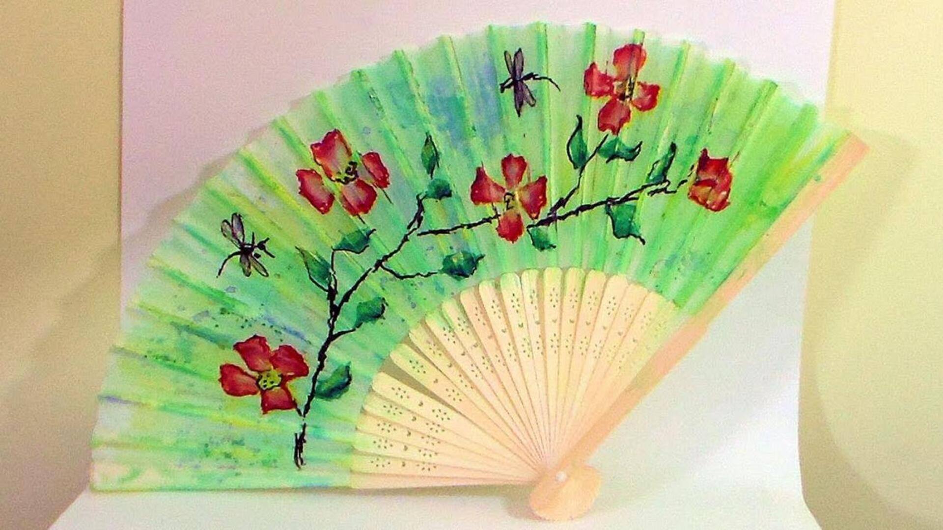 Exploring hand fan painting artistry