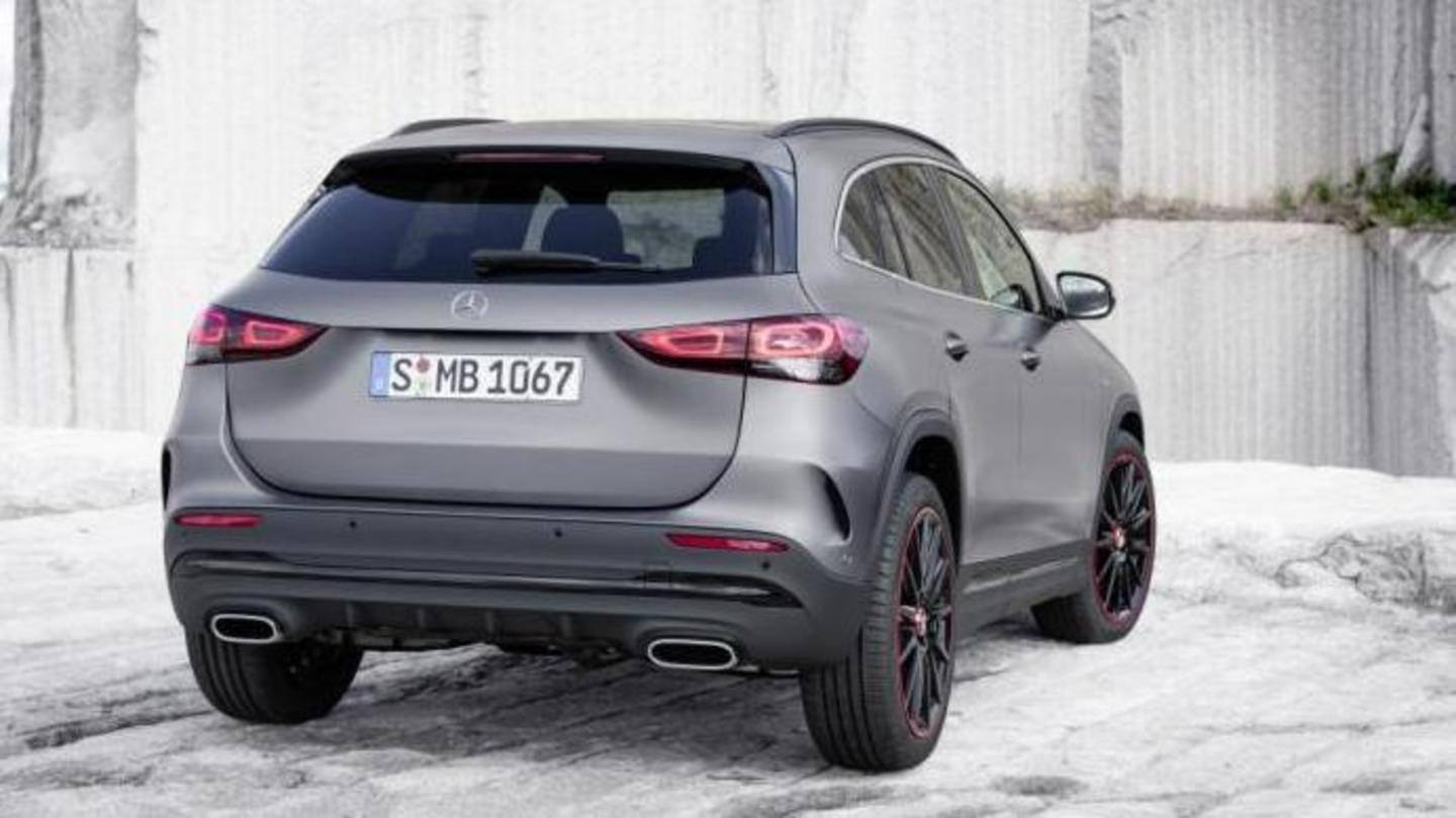 The car sports a large grille and sleek headlamps The car sports a large grille and sleek headlamps