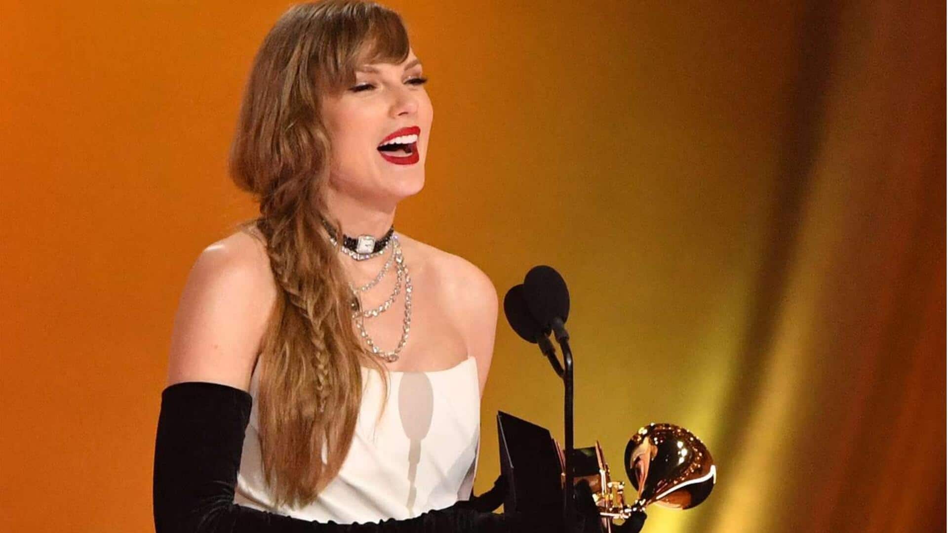 Taylor makes history with fourth Album of the Year Grammy