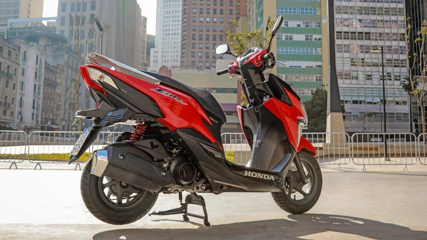 The scooter has a contoured seat and alloy wheels The scooter has a contoured seat and alloy wheels