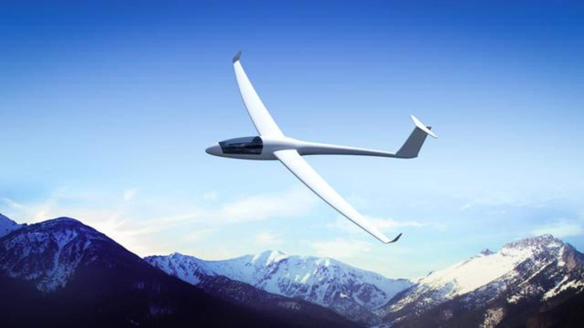 Sailplane gliding over alpine scenery: Silent skies