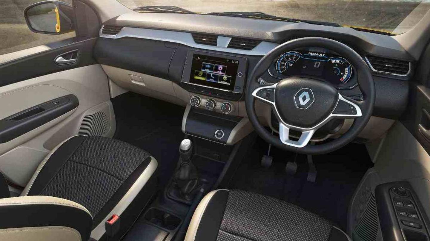 The vehicle has three rows of seats The vehicle has three rows of seats