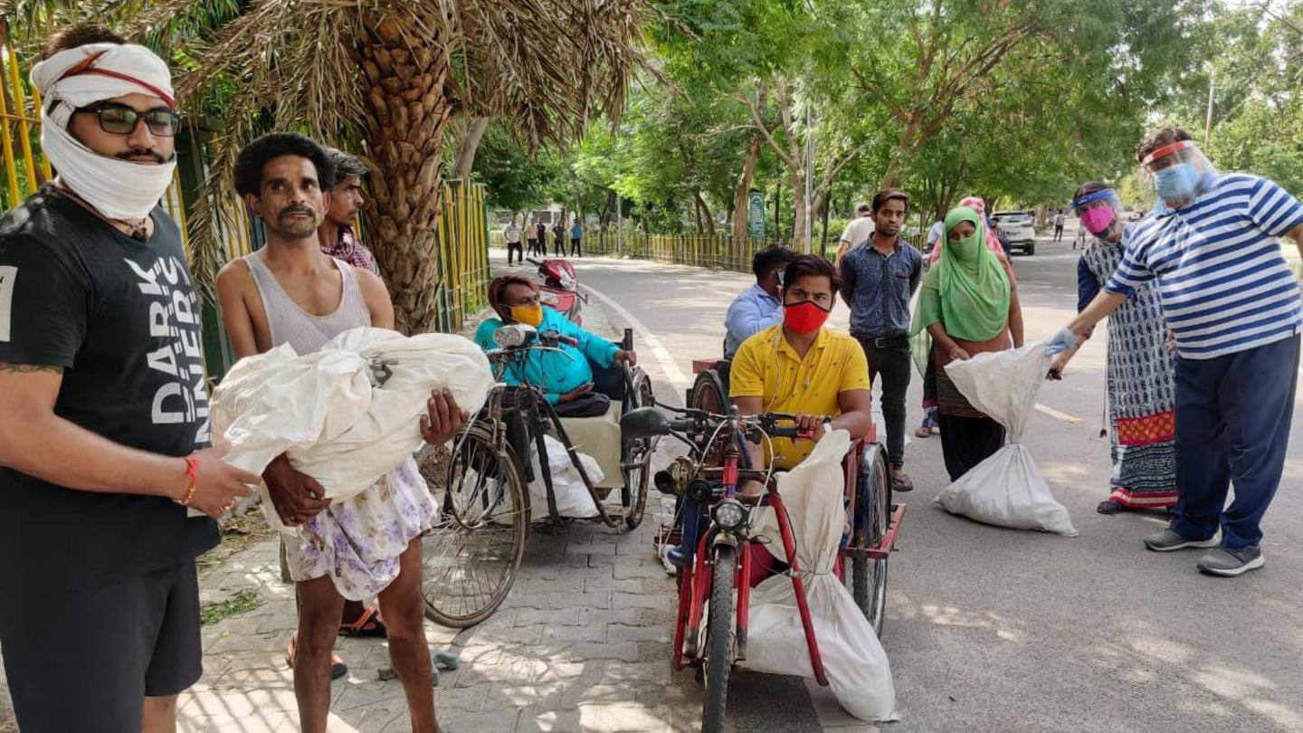 Distributing ration kits to the needy families Distributing ration kits to the needy families