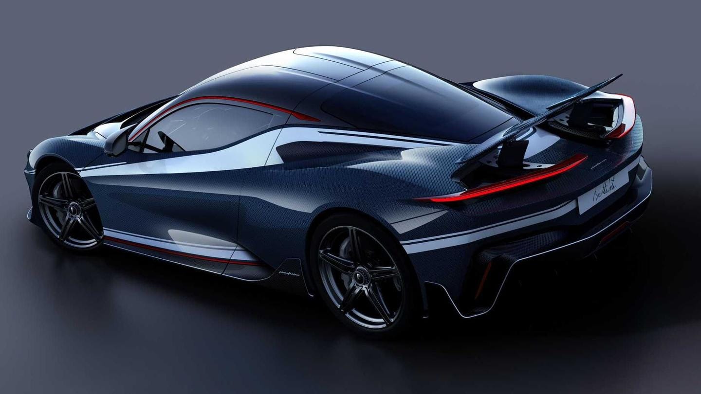 The car sports an illuminated logo and large rear wing The car sports an illuminated logo and large rear wing