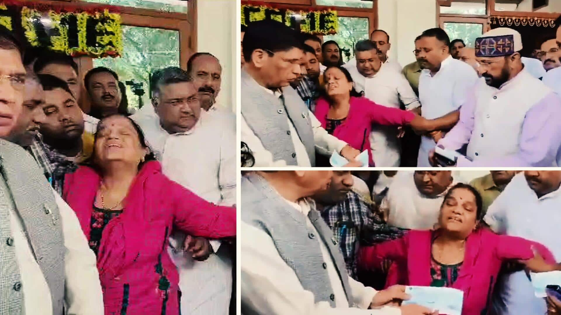 BJP minister poses with check as Rajouri martyr's mother cries