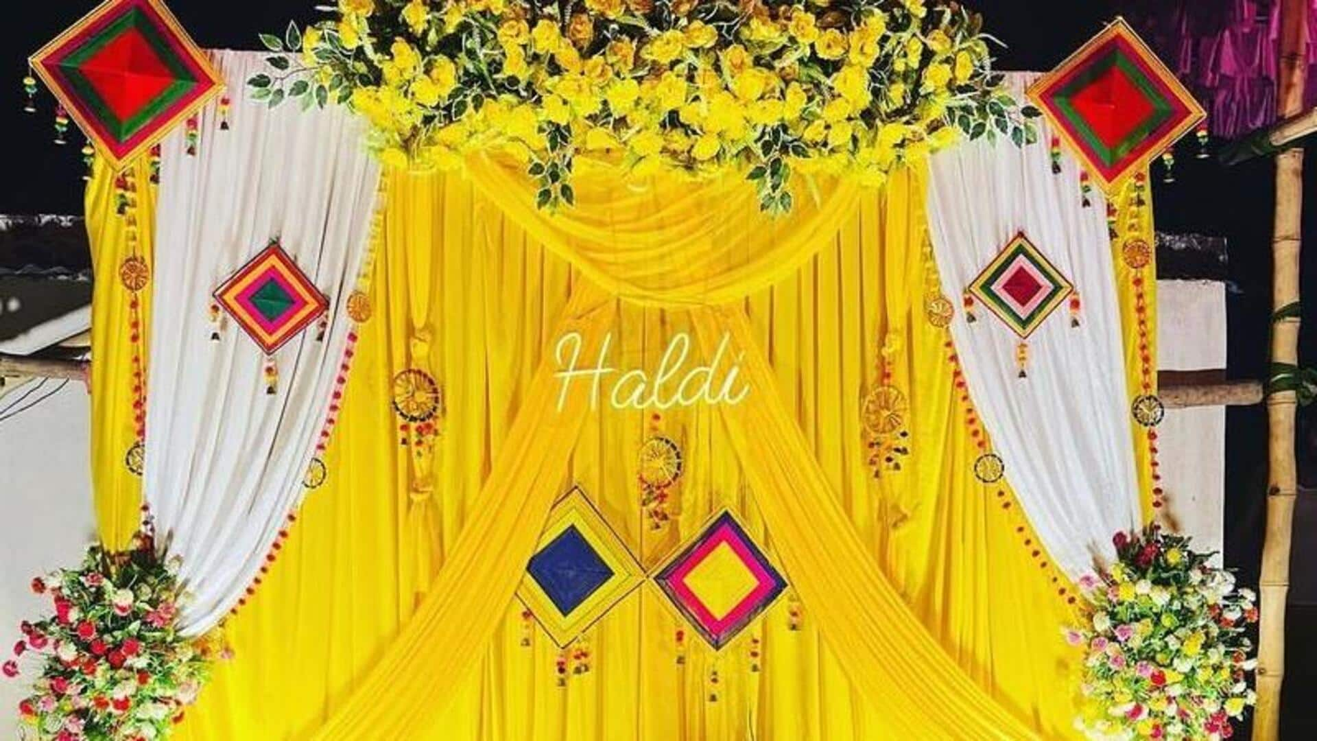 A Stunning Haldi Ceremony Standee with Lush Botanical and Radiant Marigolds  Accents.