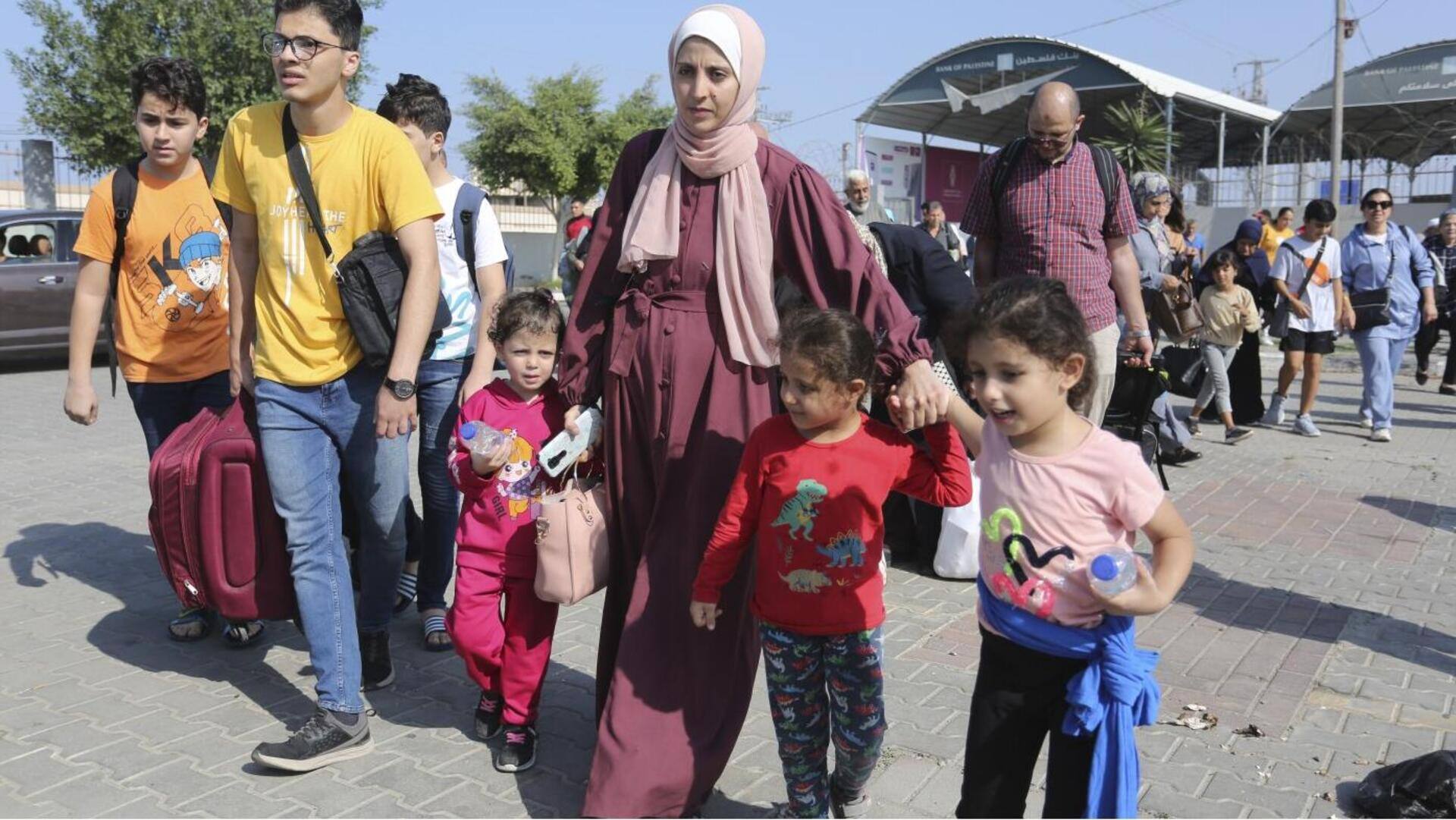 Egypt opens Rafah border crossing for first time, hundreds escape