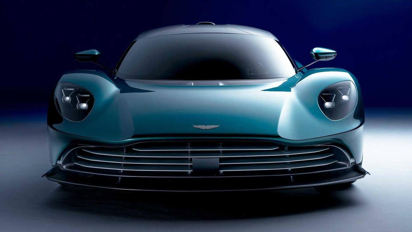 The car has eye-shaped headlamps and a large rear wing The car has eye-shaped headlamps and a large rear wing