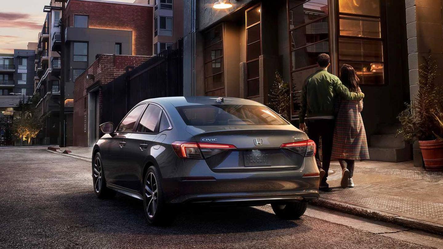 The car sports a sleek black grille The car sports a sleek black grille