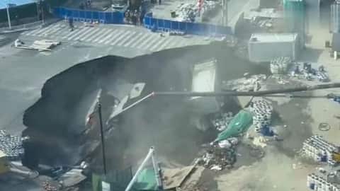 Video: Massive sinkhole swallows Shanghai road in seconds 